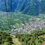Blick über Latsch aus der Seilbahn nach St. Martin im Kofel, Alto Adige, Berg, Berge, Kulturlandschaft, Latsch, Seilbahn, South Tyrol, Sudtirol, Sudtirolo, Suedtirol, Südtirol, Vinschgau, Vogelperspektive