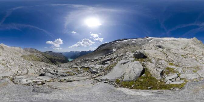 Blick auf des Neves Stausee und die Gletscherzungen des Hohen Weißzint