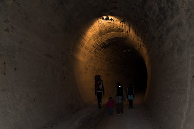Beleuchteter Tunnel am Spazier- und Mountainbikeweg Bahntrasse Fleimstalbahn Beleuchteter Tunnel am Spazier- und Mountainbikeweg Bahntrasse Fleimstalbahn